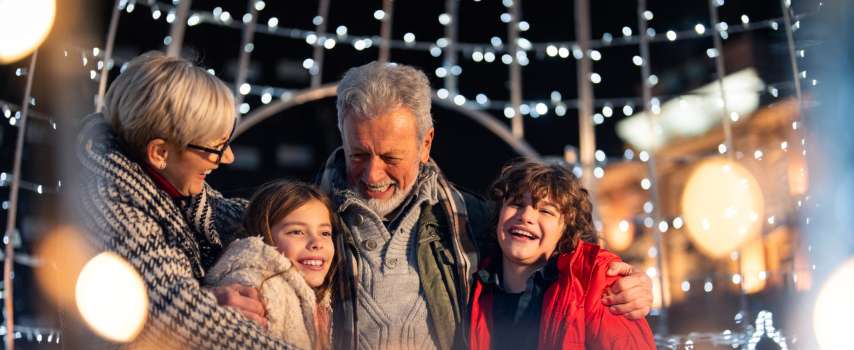 Family with Travel Insurance for Europe enjoying Christmas Markets