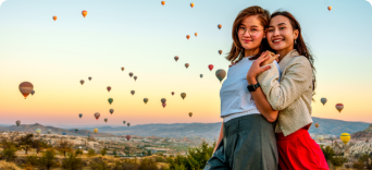 Travellers enjoying a sunrise in Indonesia
