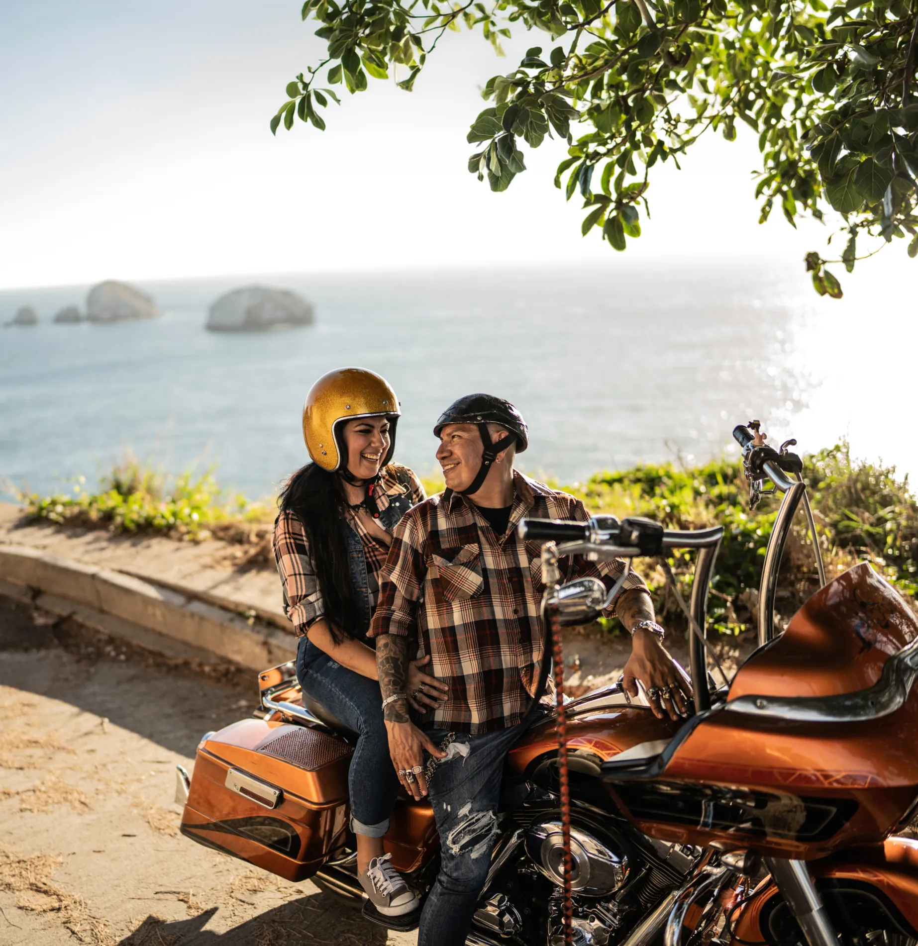 Couple exploring destination on motorbike