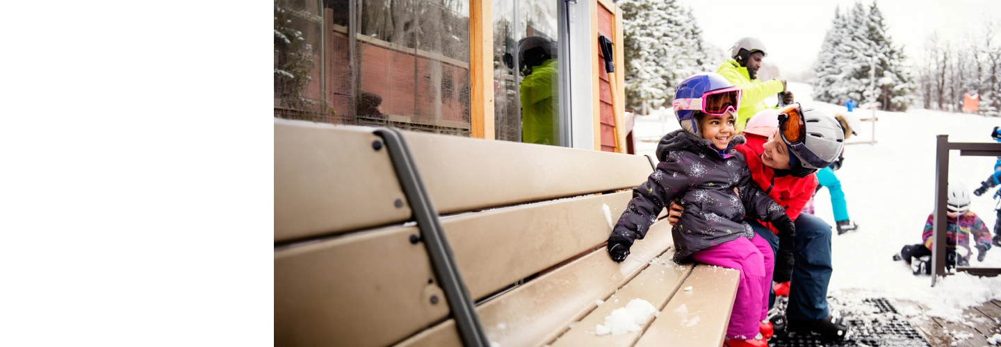 Mum and daughter enjoying the snow
