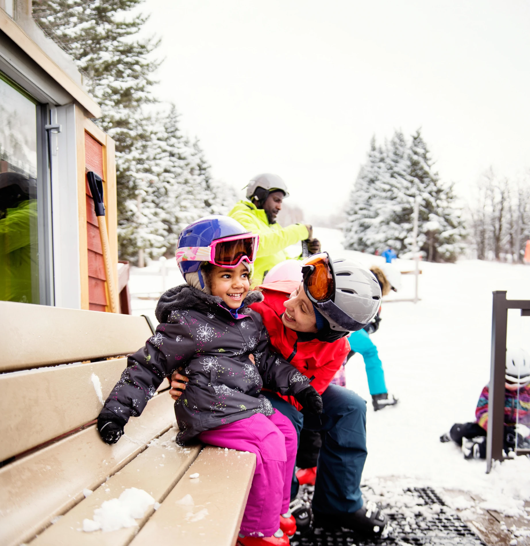 Mum and daughter enjoying the snow