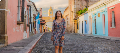 Traveller exploring destination, with mountains in the background