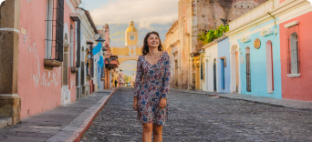 Traveller exploring destination, with mountains in the background
