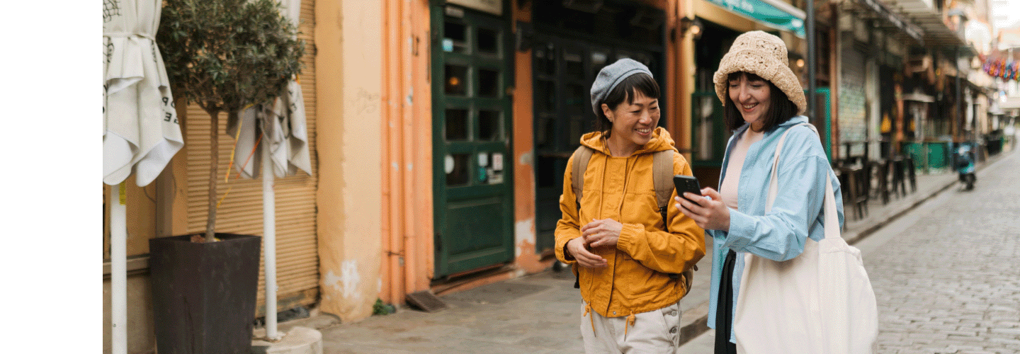 Traveller checking their phone while exploring