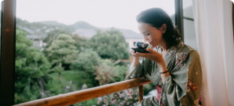 Woman drinking tea in Japan