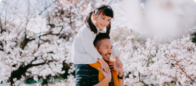 Dad and daughter enjoying cheery blossom season in Japan