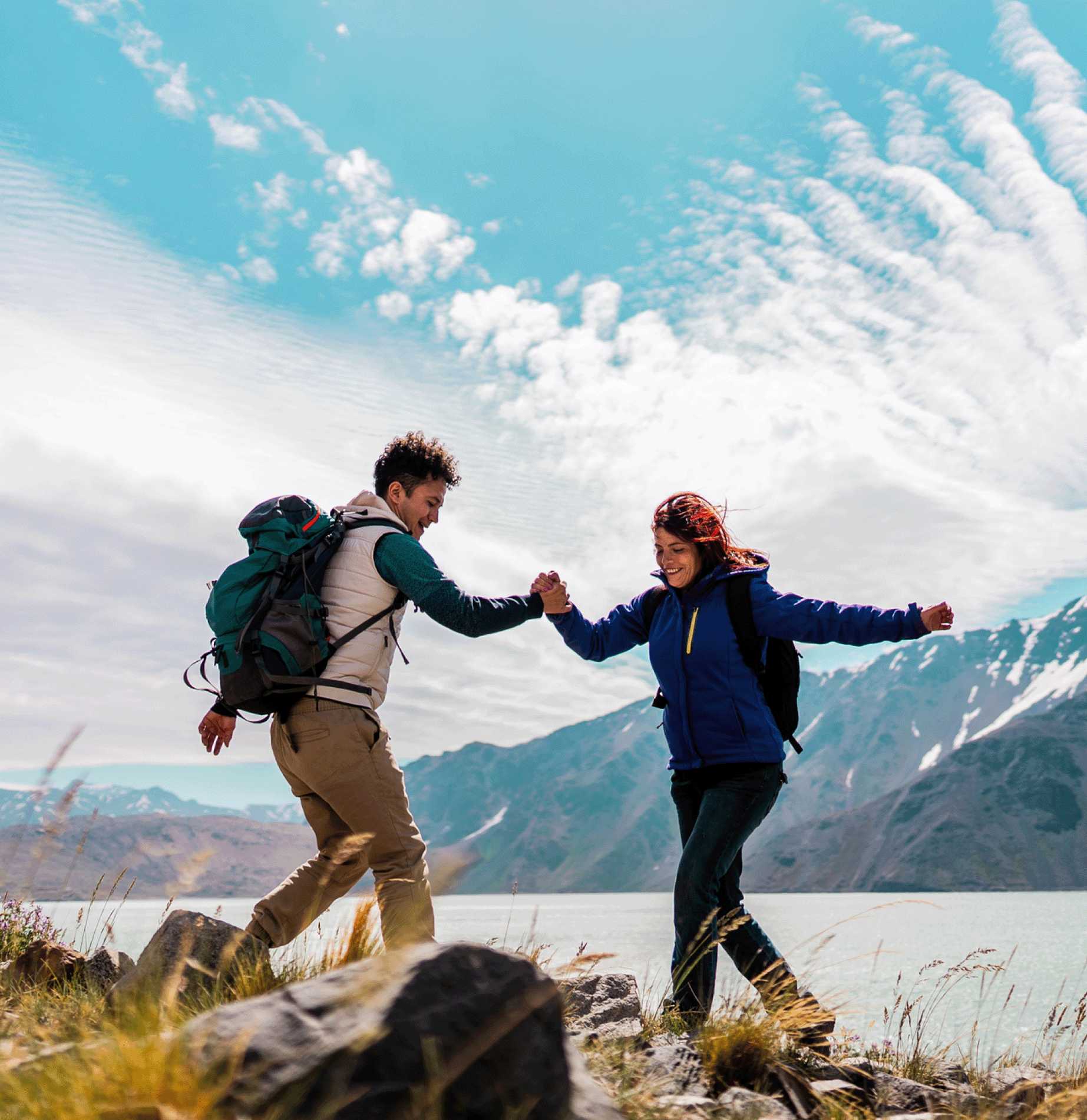 couple holding hands on a hike
