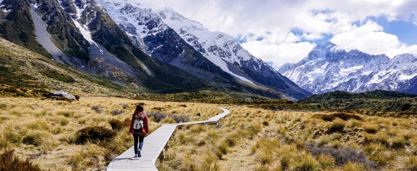 Woman walking in Mount Cook National Park New Zealand