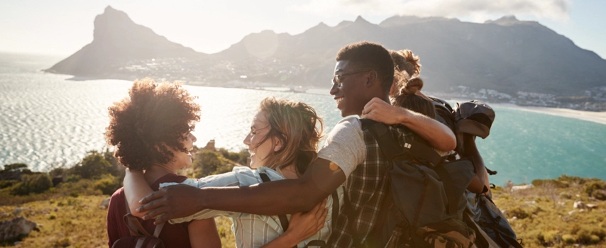 group of friends on mountain top