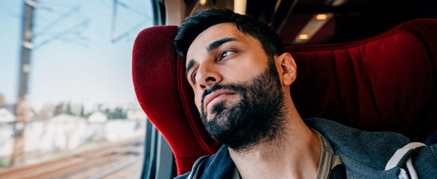 Anxious Man Travelling on Train