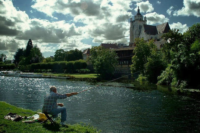 Man fishing at Besancon, France