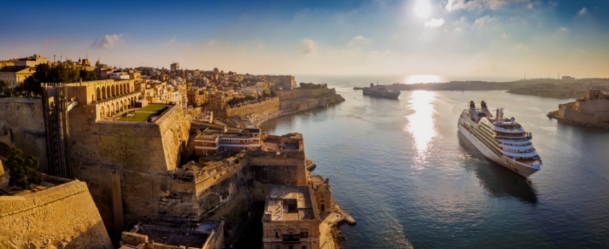 Cruise ship sailing into Valletta Malta | Cruise travel insurance