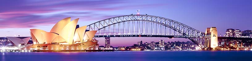 Sydney harbour bridge and opera house at dusk
