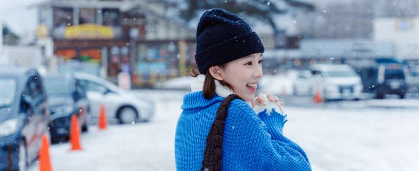 Traveller who purchased travel insurance for Japan enjoys the snow