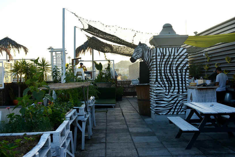 Photo of the rooftop bar at Lisbon's Sunset Destination Hostel
