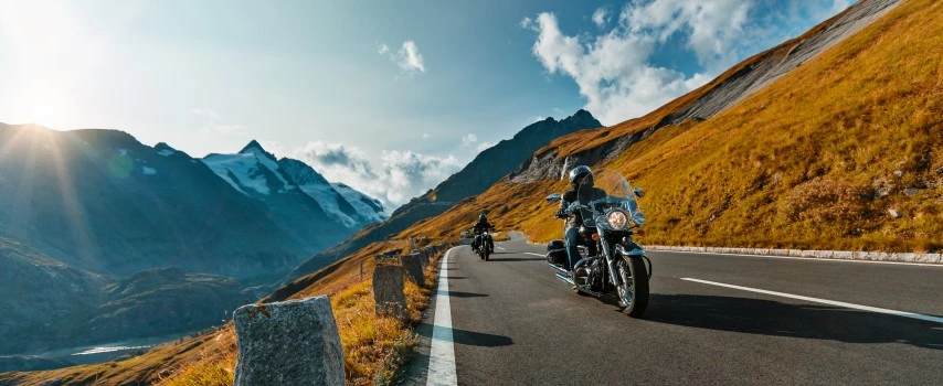 Motorcycles riding in Alpine highway in Austria