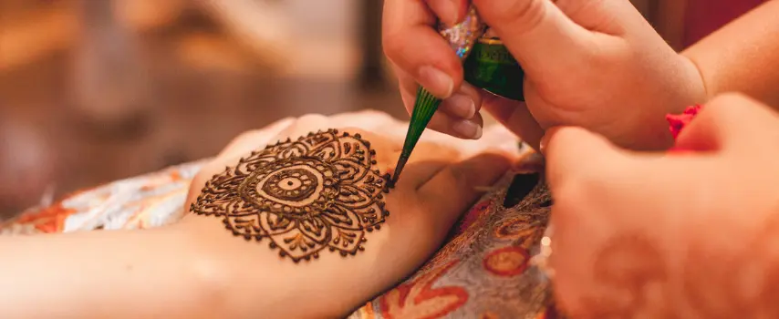 Lady's hand with a henna tattoo