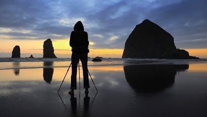 Photo of photographer at the beach a sunset