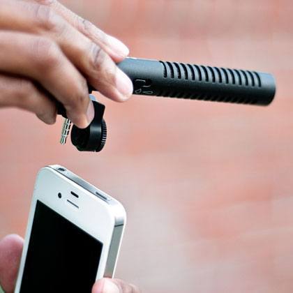 Photo of a microphone being attached to an iPhone