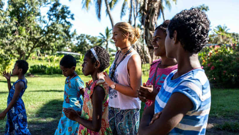 Stephen and Jess spending time with the local Fijians