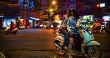 Thumbnail image of 2 Vietnamese girls on a moped