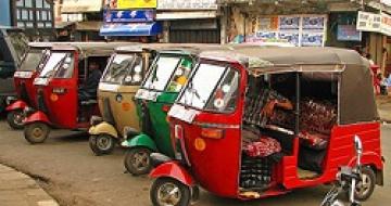 Thumbnail image of Tuk-tuks waiting for fares in Sri Lanka