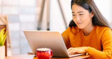 Young Asian Female on Laptop